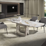 Mesa comedor extensible ovalada barril mármol porcelánico y acero arena metalizado