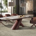 Mesa comedor extensible ovalada barril mármol porcelánico y acero marrón cobrizo