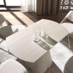 Mesa comedor extensible redonda mármol porcelánico y acero color arena