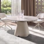 Mesa comedor extensible redonda mármol porcelánico y acero color arena