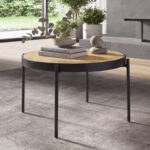 Round coffee table in rattan and black steel