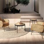 Tavolino rotondo in rattan e acciaio nero