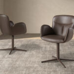 Swivel chair in chocolate brown leatherette