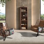 Brown leather and fabric swivel armchair with brown print