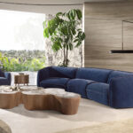 Fauteuil pivotant en velours bleu foncé