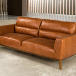 3-seater sofa upholstered in leather with Walnut wood legs