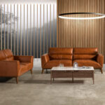 3-seater sofa upholstered in leather with Walnut wood legs