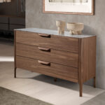 Walnut chest of drawers with marble-effect glass top