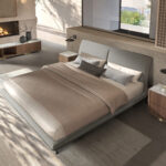 Lit en tissu gris foncé