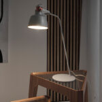 Table lamp in gray epoxy steel and bronze details