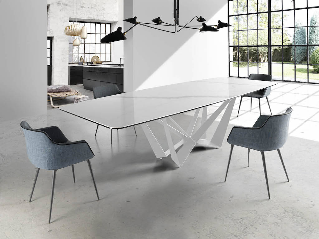 Rectangular dining table with steel structure and ceramic marble cover. Rectangular dining table with steel structure and ceramic marble cover.