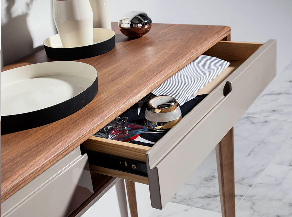 Hallway console with solid wooden legs and a walnut veneer structure Hallway console with solid wooden legs and a walnut veneer structure