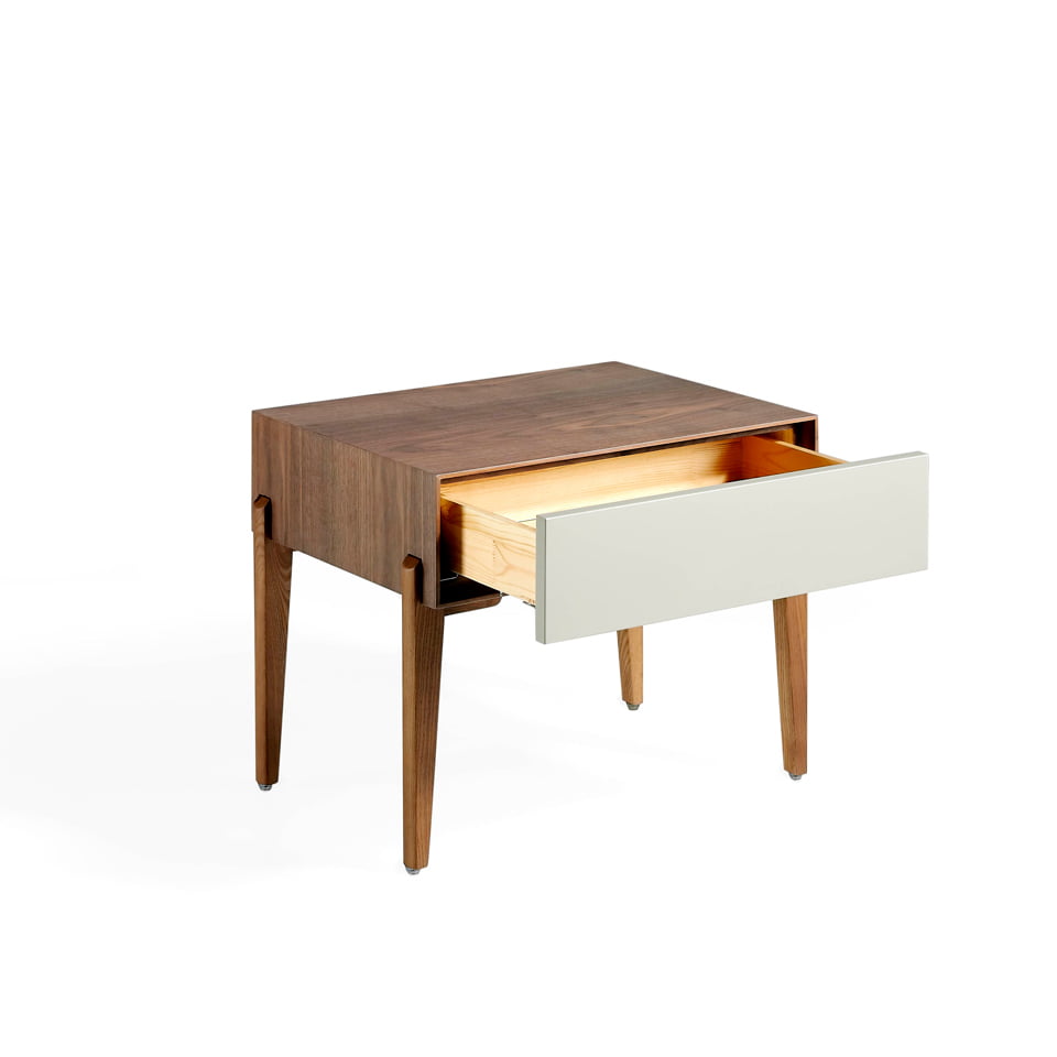 Bedside table with solid wooden legs and a Walnut veneer structure Bedside table with solid wooden legs and a Walnut veneer structure