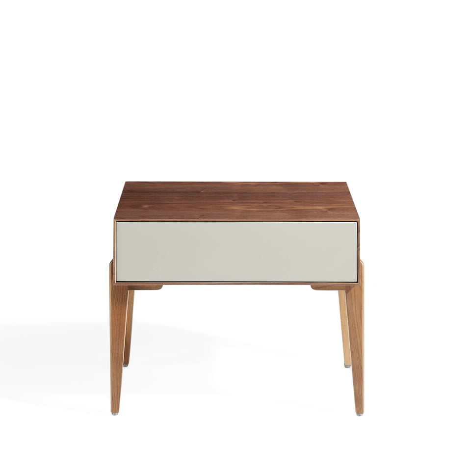 Bedside table with solid wooden legs and a Walnut veneer structure Bedside table with solid wooden legs and a Walnut veneer structure