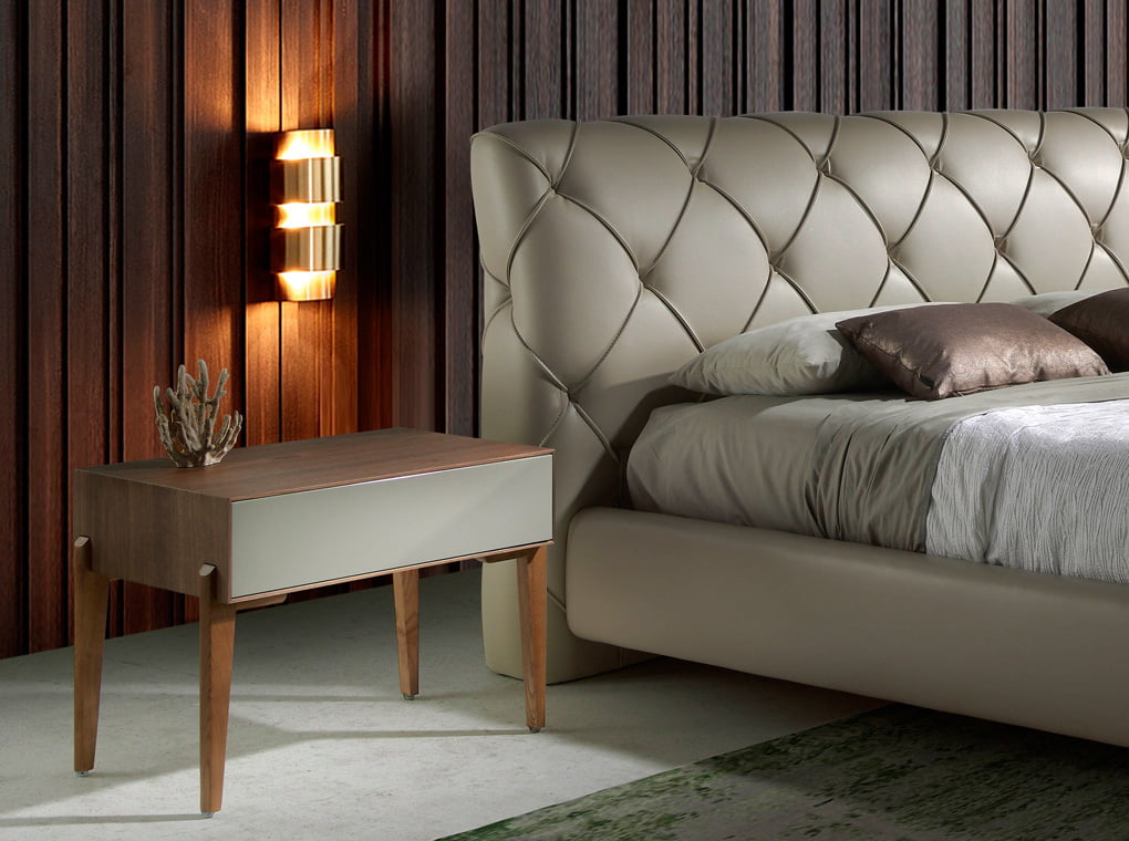 Bedside table with solid wooden legs and a Walnut veneer structure Bedside table with solid wooden legs and a Walnut veneer structure