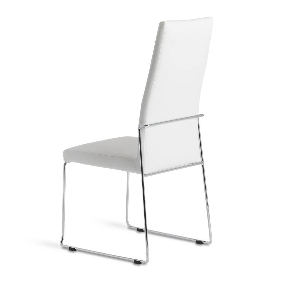 Upholstered chair with stainless steel frame. Upholstered chair with stainless steel frame.