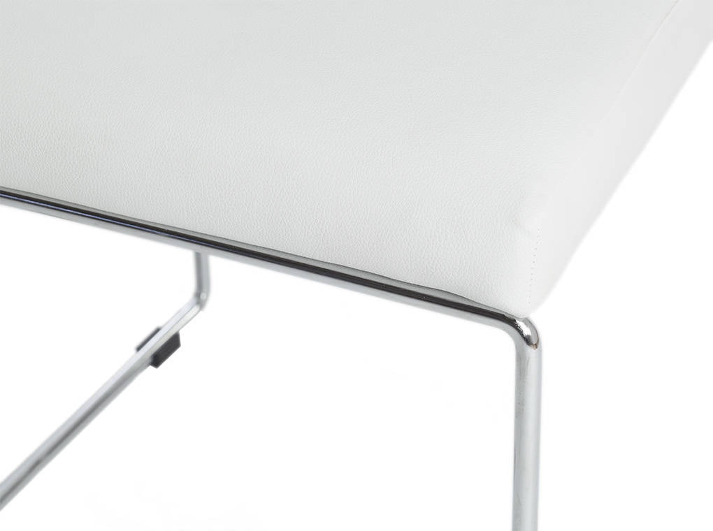 Upholstered chair with stainless steel frame. Upholstered chair with stainless steel frame.