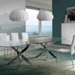 Chair upholstered in leatherette with chromed steel frame