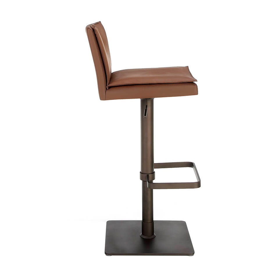 Stool Upholstered in brown leatherette with legs in brown epoxy Stool Upholstered in brown leatherette with legs in brown epoxy