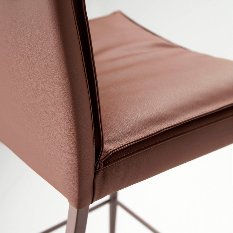 Stool upholstered in leatherette with legs in epoxy Stool upholstered in leatherette with legs in epoxy
