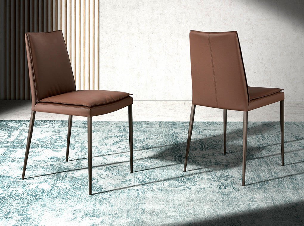 Chair upholstered in leatherette with legs in brown epoxy Chair upholstered in leatherette with legs in brown epoxy