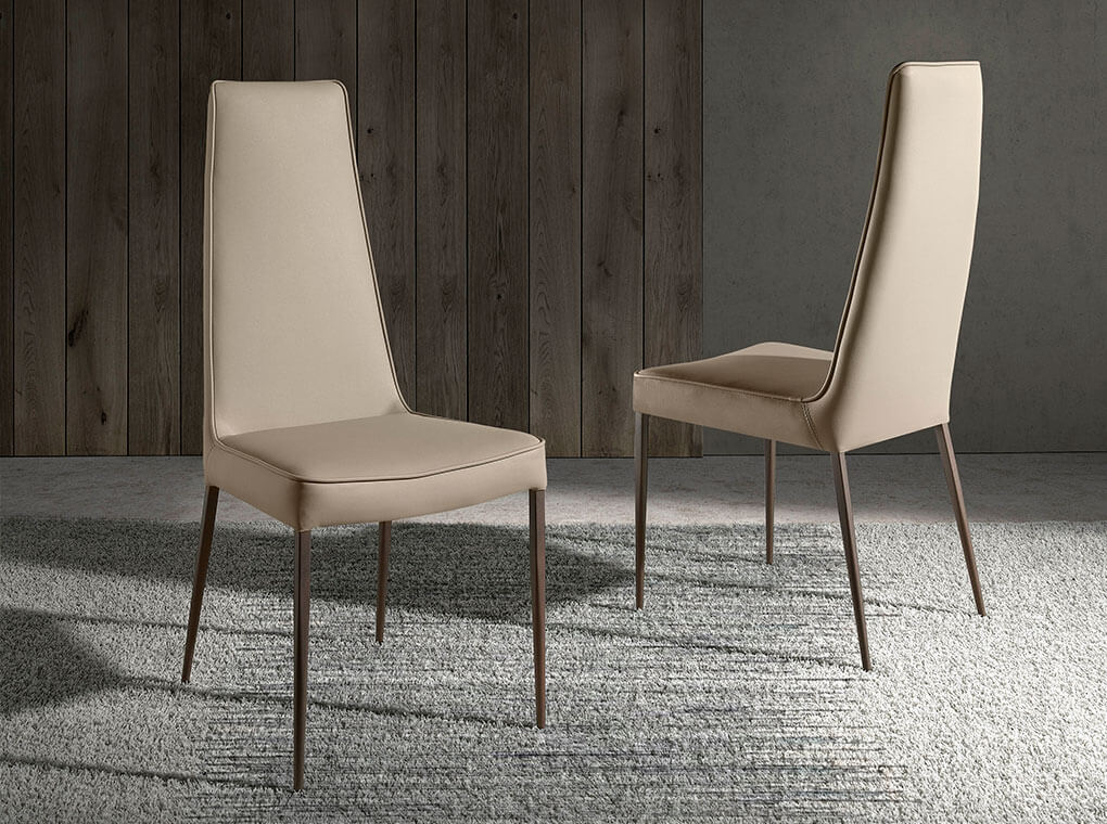 Chair upholstered in leatherette and legs in brown epoxy Chair upholstered in leatherette and legs in brown epoxy