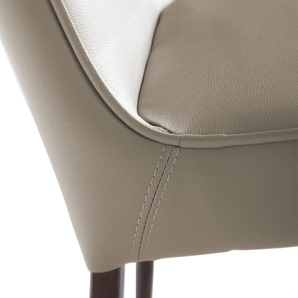 Chair upholstered in leatherette and legs in brown epoxy Chair upholstered in leatherette and legs in brown epoxy