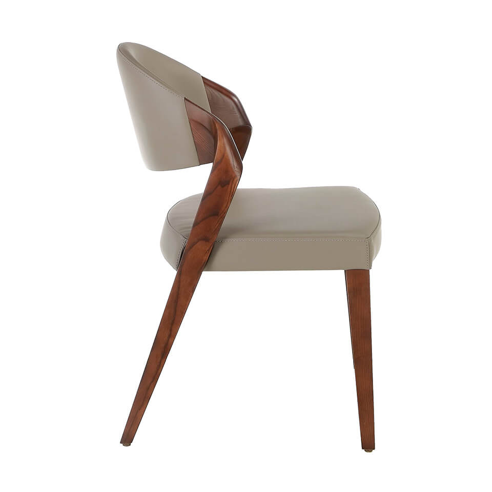 Chair upholstered in leatherette with Walnut colored wooden structure Chair upholstered in leatherette with Walnut colored wooden structure