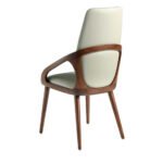 Chair upholstered in leatherette with Walnut colored wooden structure