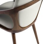 Chair upholstered in leatherette with Walnut colored wooden structure