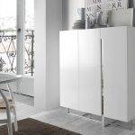 White wooden sideboard and chrome steel