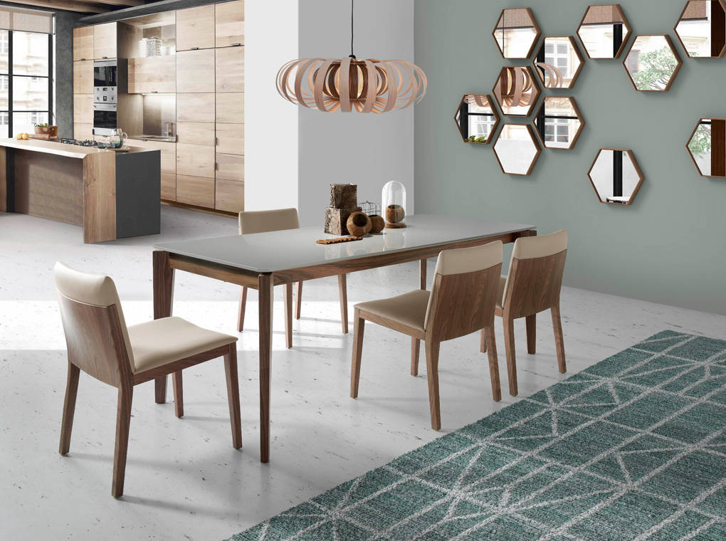 Dining table manufactured in wood with walnut plating Dining table manufactured in wood with walnut plating