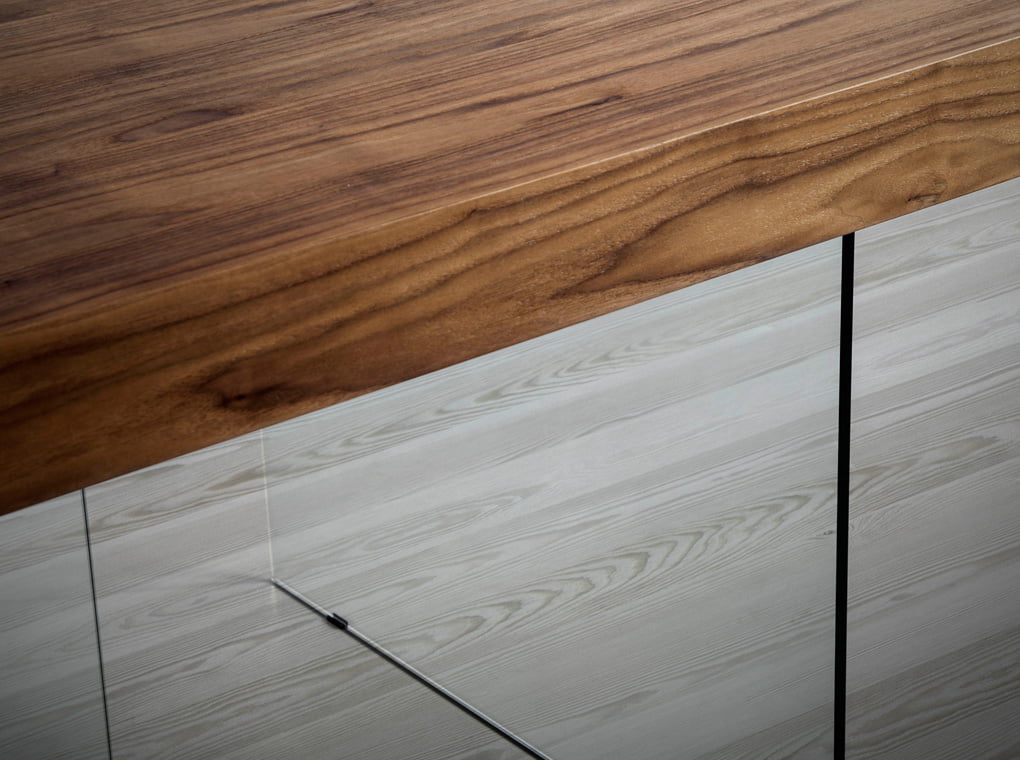 Dining table with walnut-veneered MDF top and tempered glass legs Dining table with walnut-veneered MDF top and tempered glass legs