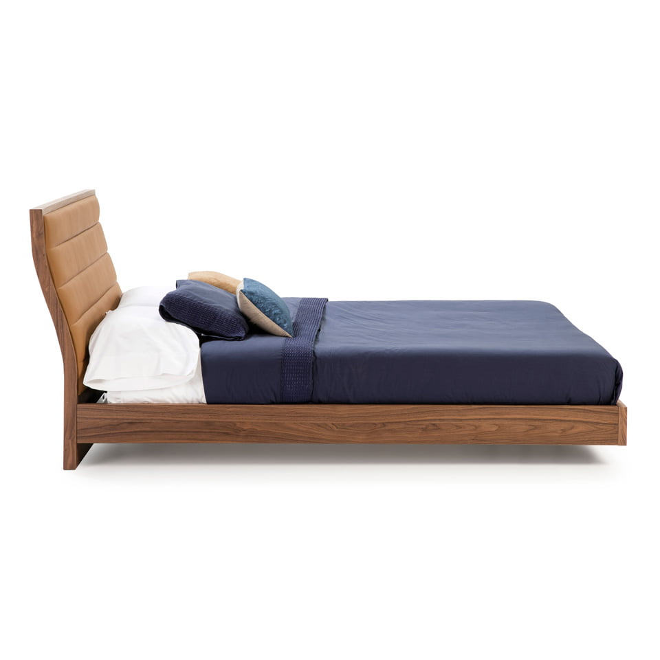 Bed upholstered in leatherette and Walnut wood Bed upholstered in leatherette and Walnut wood