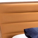 Bed upholstered in leatherette and Walnut wood