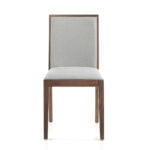 Chair upholstered in fabric with Walnut colored wooden structure