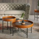 Round walnut wood coffee table upholstered in leather and black steel