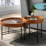 Round walnut wood coffee table upholstered in leather and black steel