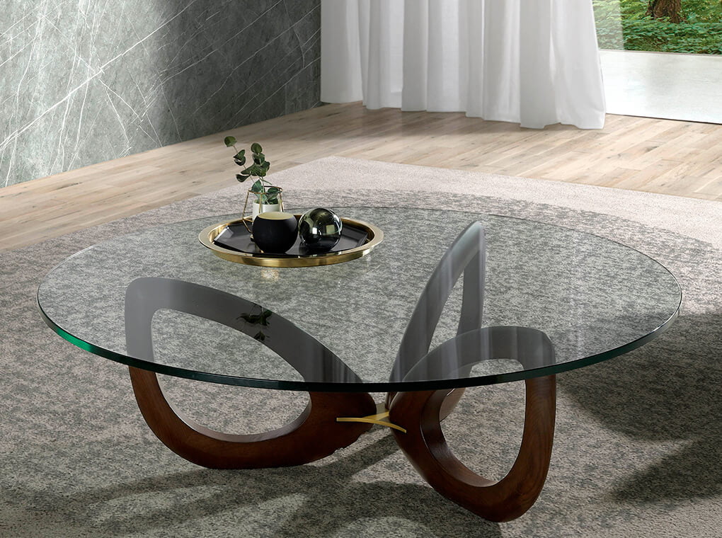 Coffee table made of solid wood with glass tabletop Coffee table made of solid wood with glass tabletop