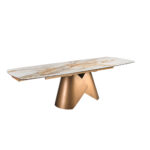 Mesa comedor extensible ovalada barril mármol porcelánico y acero color bronce