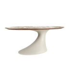 Oval dining table in porcelain marble and sand-coloured epoxy fiberglass
