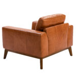 Sillón tapizado en piel y patas madera Nogal