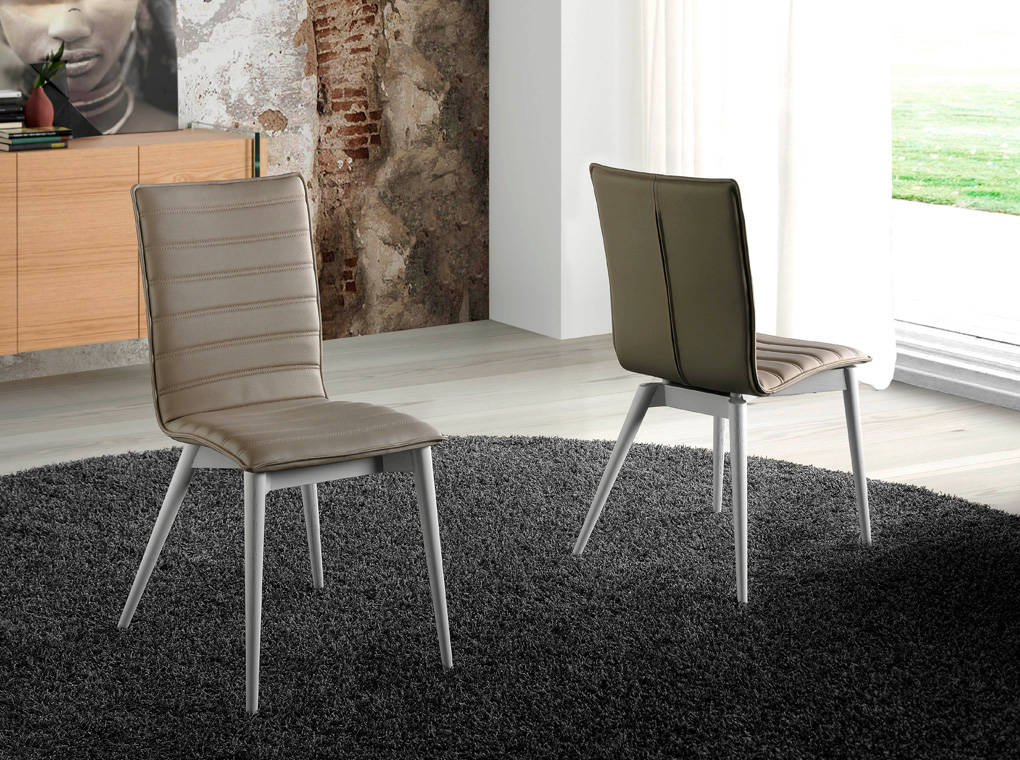 Upholstered chair with leg in walnut color. Upholstered chair with leg in walnut color.
