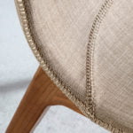 Chair upholstered in fabric with structure in Walnut color