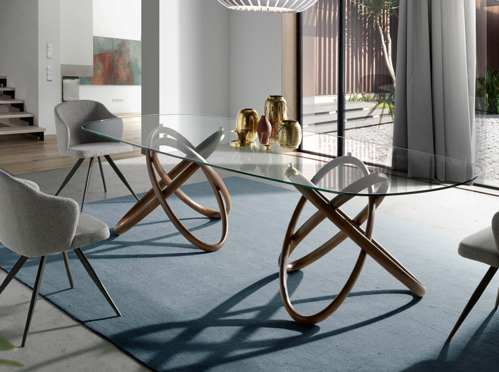 Glass dining table with double base in solid walnut wood Glass dining table with double base in solid walnut wood