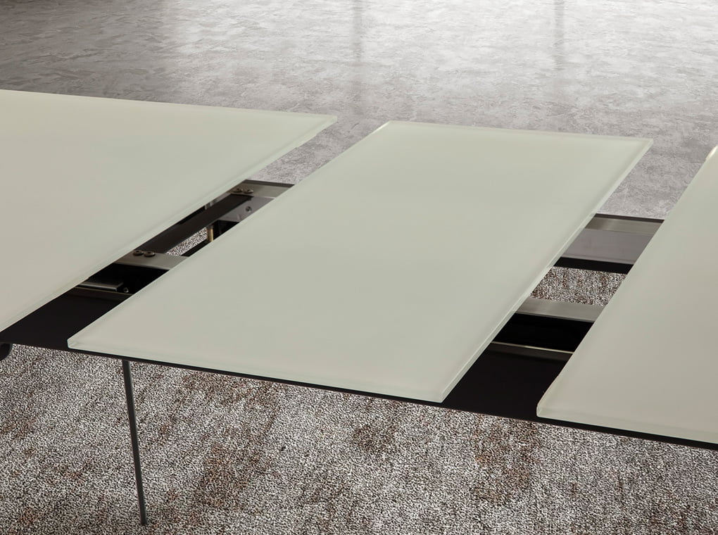 Dining table with extendable center made of stainless steel painted in black Dining table with extendable center made of stainless steel painted in black