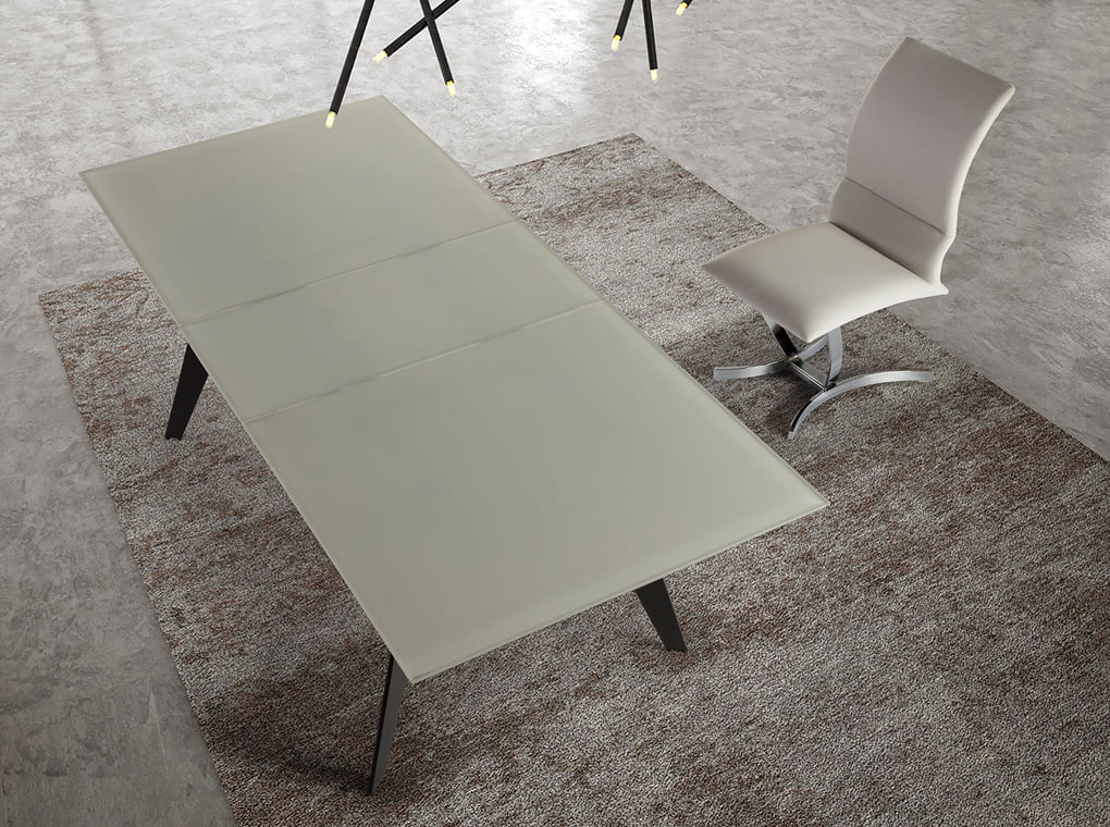 Dining table with extendable center made of stainless steel painted in black Dining table with extendable center made of stainless steel painted in black