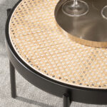 Round coffee table in rattan and black steel