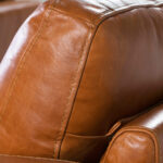 3-seater sofa upholstered in leather with Walnut wood legs