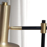 Lámpara de pie en aluminio dorado y acero negro